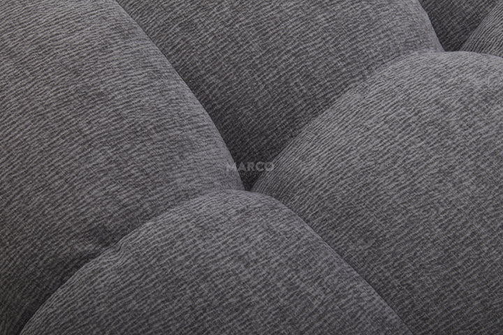 Close-up of a textured gray fabric surface