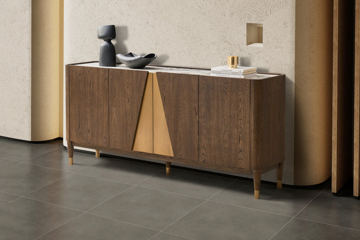 Wooden sideboard with decorative items against a neutral wall.