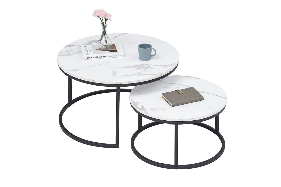 Round marble coffee table with black metal frame on white background
