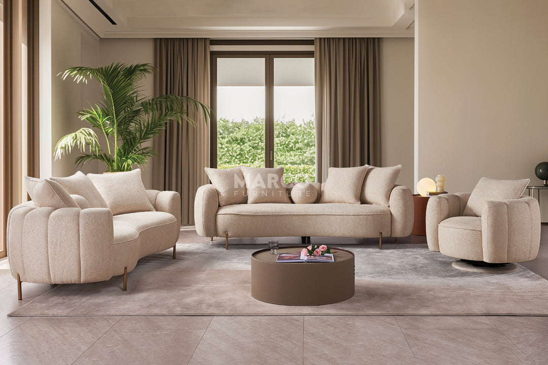 Modern living room with beige furniture and a large window.