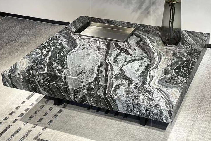 Marble-like countertop with a sink in a modern kitchen.