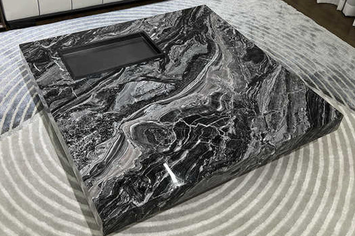 Black and gray marbled surface with a rectangular cutout.