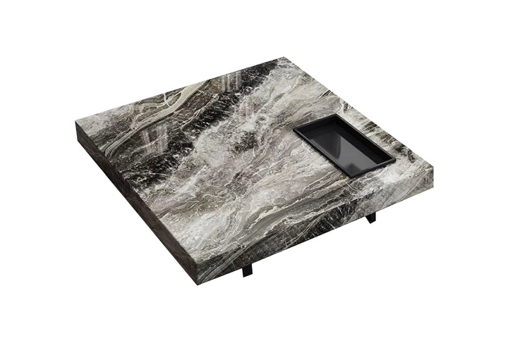 Marble-patterned coffee table with a black tray on a white background