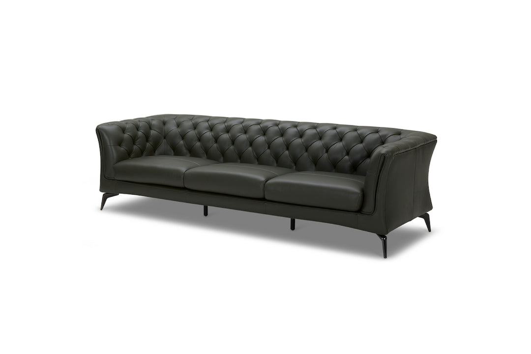 Gray tufted sofa on a white background