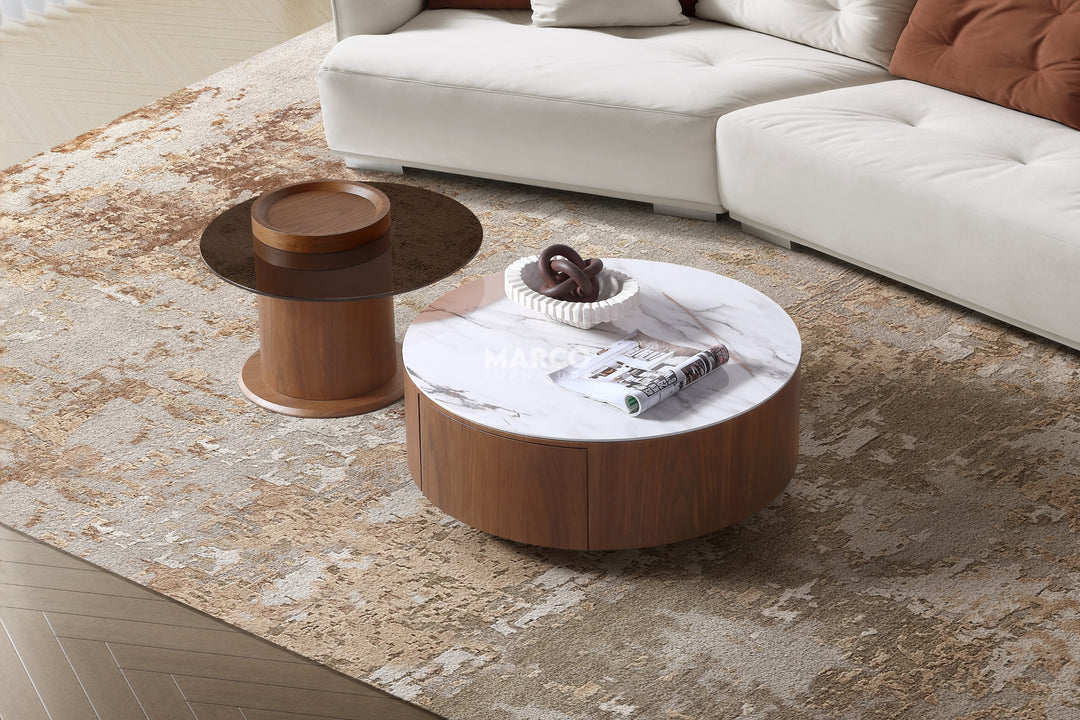 Bahamas Nesting Coffee Table Set with a magazine on a patterned rug in a living room setting.