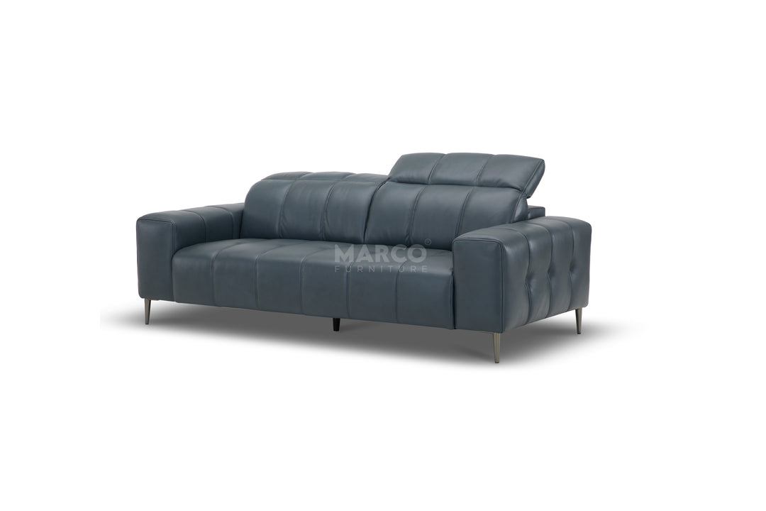 Blue sofa with 'Marco' branding on a white background