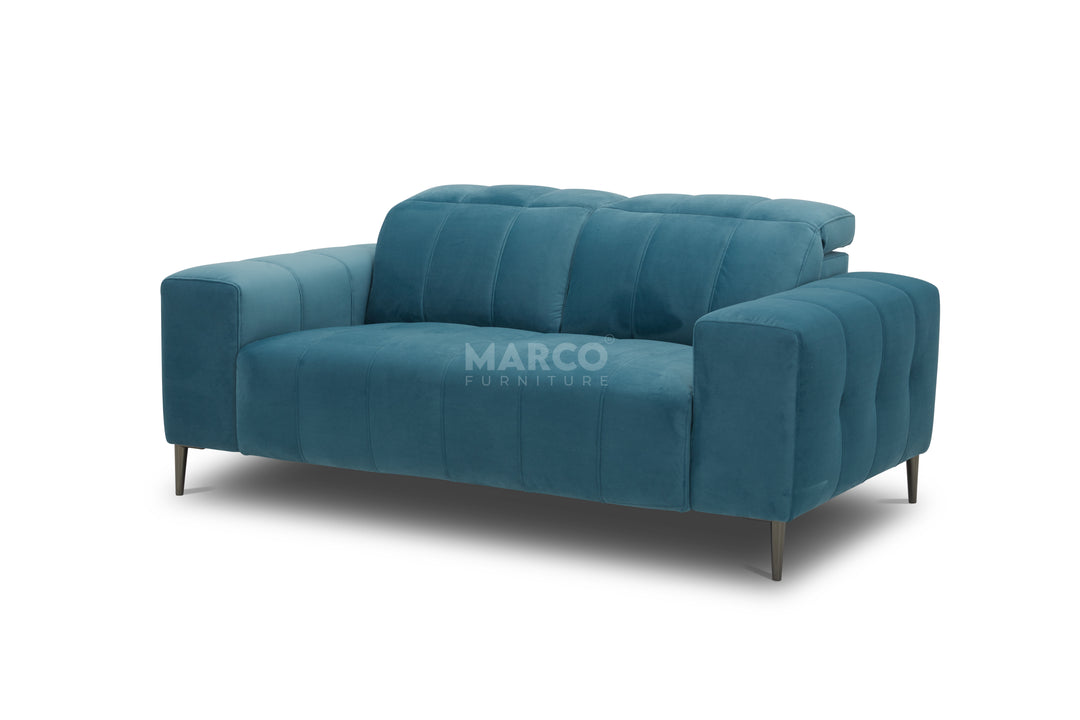 Blue sofa with 'Marco' branding on a white background