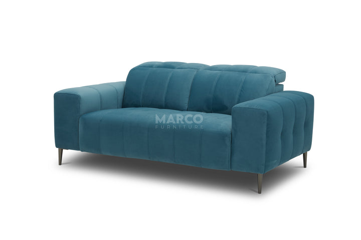 Blue sofa with 'Marco' branding on a white background