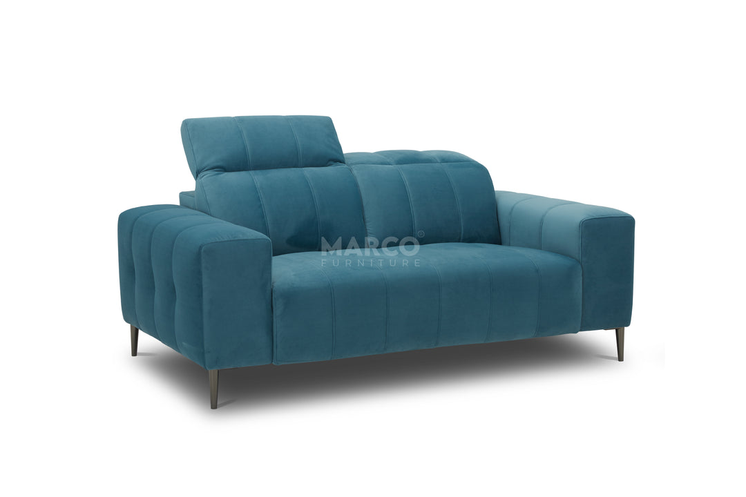 Blue sofa with 'Marco' branding on a white background
