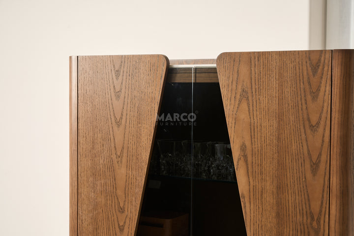 Wooden cabinet with a glass panel displaying the brand 'MARCO' on a white background