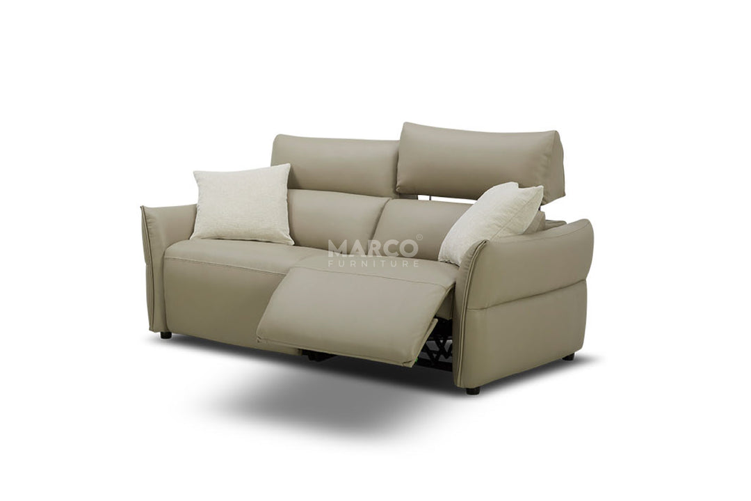 Beige sofa with white cushions on a white background, featuring the brand 'Marco'.