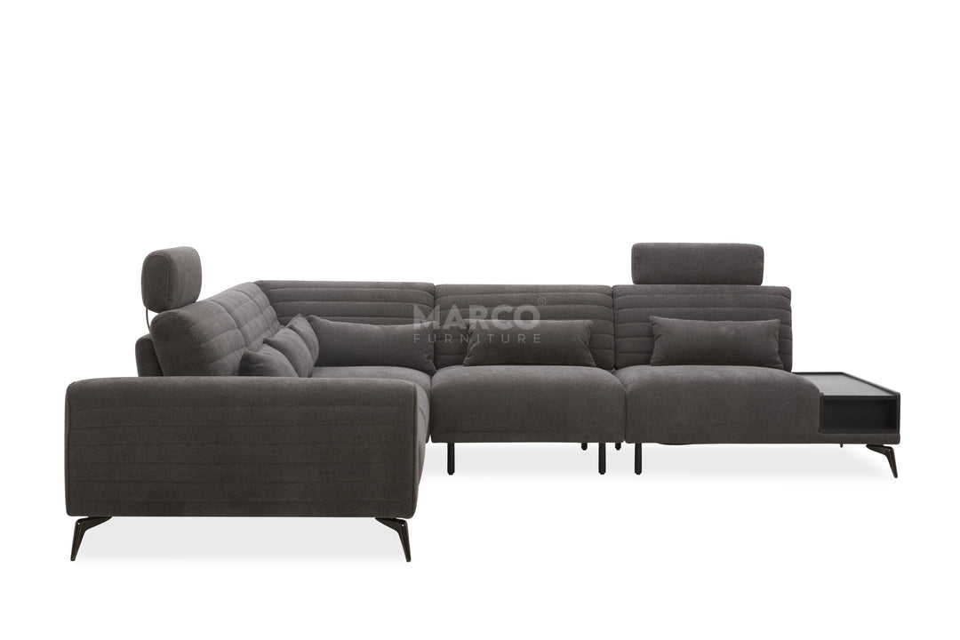 Gray sectional sofa with a coffee table on a white background, branded 'Marco'.