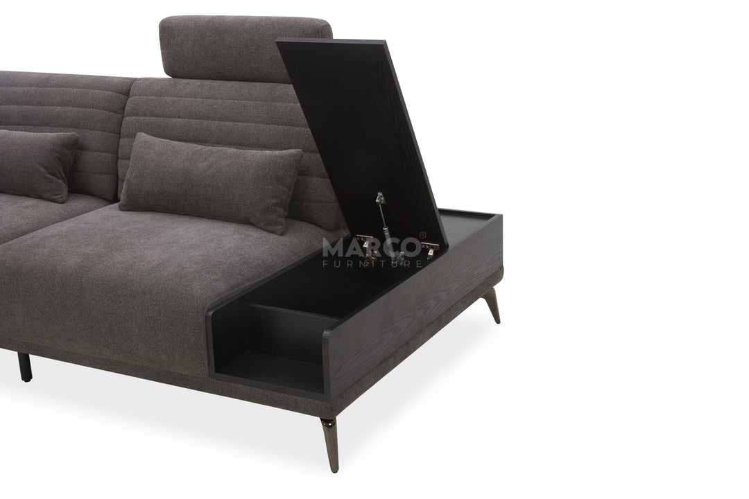 Gray sectional sofa with a built-in coffee table on a white background, featuring the Marco brand.