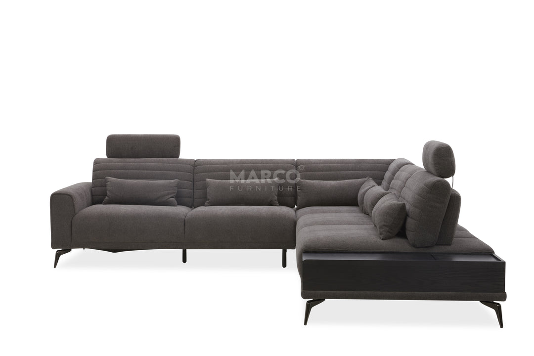 Gray sectional sofa with black accents on a white background, featuring the brand 'Marco'.