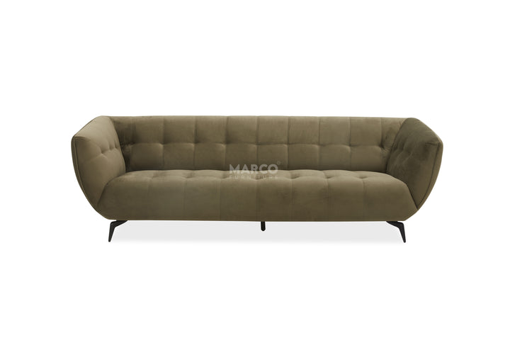 Green sofa with tufted design on a white background