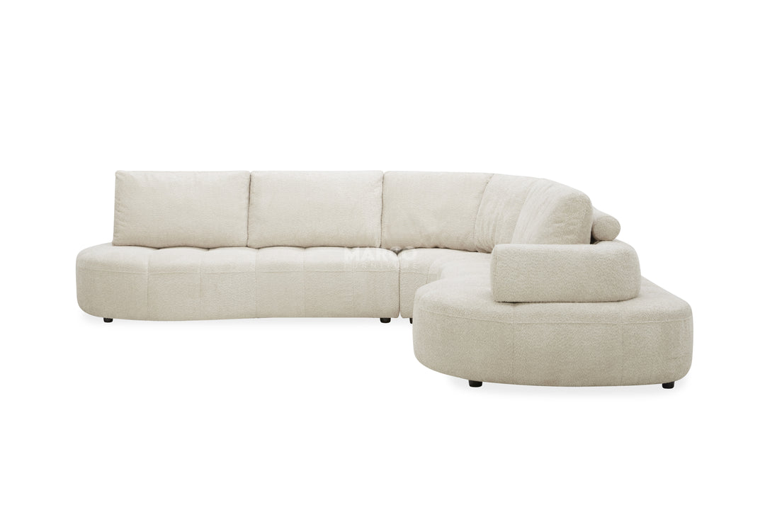 Beige sectional sofa on a white background