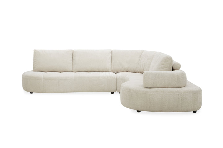 Beige sectional sofa on a white background