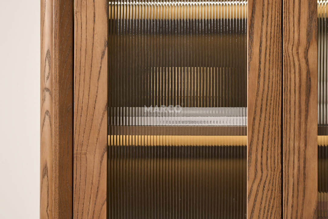 Close-up of a wooden loom with threads and wooden frames.