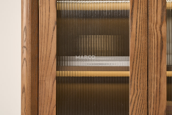 Close-up of a wooden loom with threads and wooden frames.