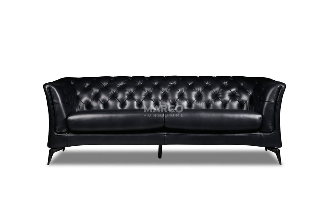 Black leather sofa on a white background