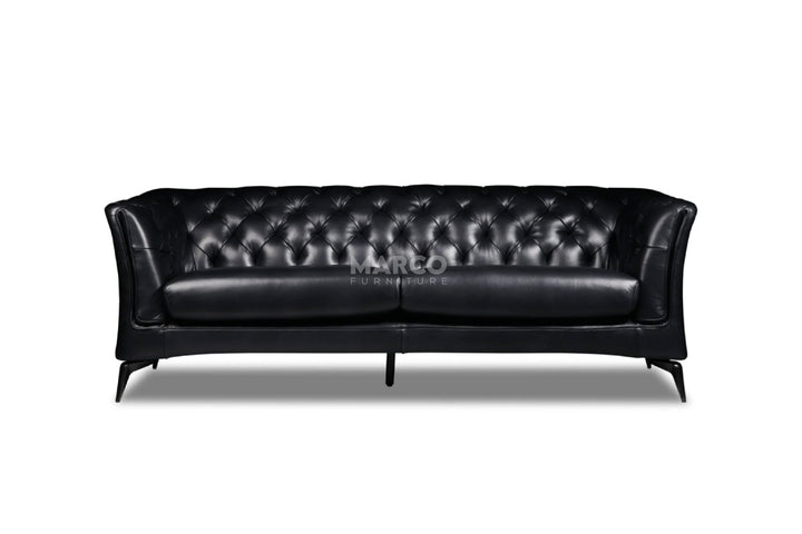 Black leather sofa on a white background